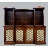 Regency rosewood breakfront bookcase with cupboards below, open shelving above, 176 x 195 x 40 cms.