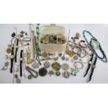 Collection of costume jewellery, including beaded necklaces, chains, butterfly brooches, torque