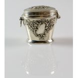 Victorian silver urn-form tea caddy, chased with scrolling floral motif surrounding vacant