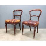 Set of four 19th mahogany balloon back ding chairs with leather seats