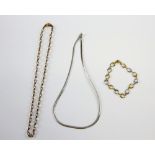 Two colour gold necklace and bracelet set and a white gold snake chain, all 9 ct . 13 grams
