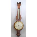 19th century mahogany wheel barometer inlaid with shells , the silvered dial signed G Selva & Co.
