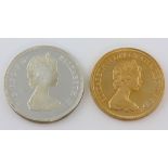 Gold five pound coin dated 1981, and another in silver commemorating the marriage of Prince