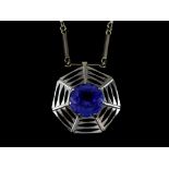 Pendant set with large Tanzanite stone of approximately 22.20 carats, in white gold hand crafted web