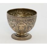 Victorian silver footed bowl, the body chased with scrolls and flowers, with central engraved shield