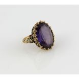 Vintage amethyst ring, with large oval cut stone, estimated weight 13.72 carats, mounted in 9 ct,