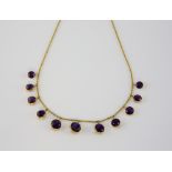 Victorian amethyst necklace, eleven graduated round cut amethyst, estimated weight between 1.00