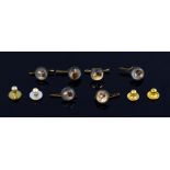 A set of Essex crystal style shirt studs, each depicting a dogs head, in gilt metal mount and two