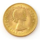 Elizabeth II gold sovereign coin, 1968 .