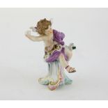 20th century porcelain Meissen figure of a seated putto, blue crossed sword factory mark underneath,