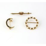 Three gem set brooches, seed pearl crown bar brooch in 14 ct, a sapphire and pearl crescent brooch