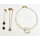 Three gem set pendants, double garnet cluster drop pendant, multi stone floral cluster pendant and