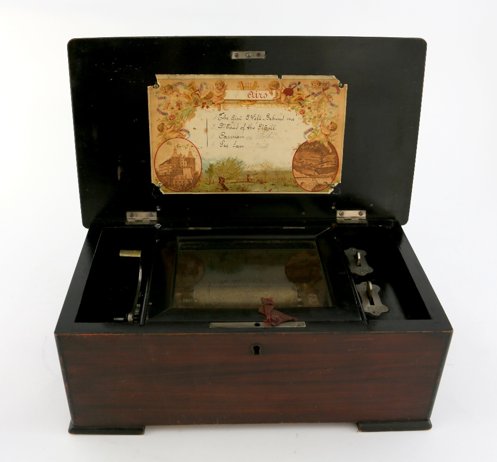 Early 20th century cylinder music box playing 4 airs on a 9.5cm cylinder.