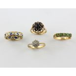 Four gem set rings, diamond cluster ring set with nineteen Swiss cut diamonds, ring size M, 1970's
