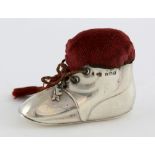 George V silver novelty pin cushion in the form of a laced boot, by Levi & Salaman, Birmingham,