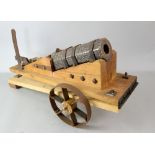 16th century cast hand-cannon of octagonal section with flared base associated trolley. 25cm