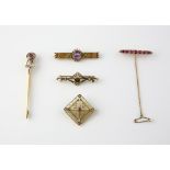 Collection of six antique and vintage brooches, red paste and old cut diamond brooch, mounted in