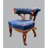 19th century mahogany tub shaped button back chair on reeded turned tapering legs