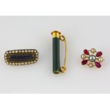 Three brooches, ruby and pearl brooch, central round grey pearl, measuring approximately 5.5mm in