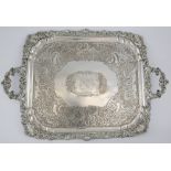 Silver plated two handled tray, rectangular with shell and scroll border, the centre chased with