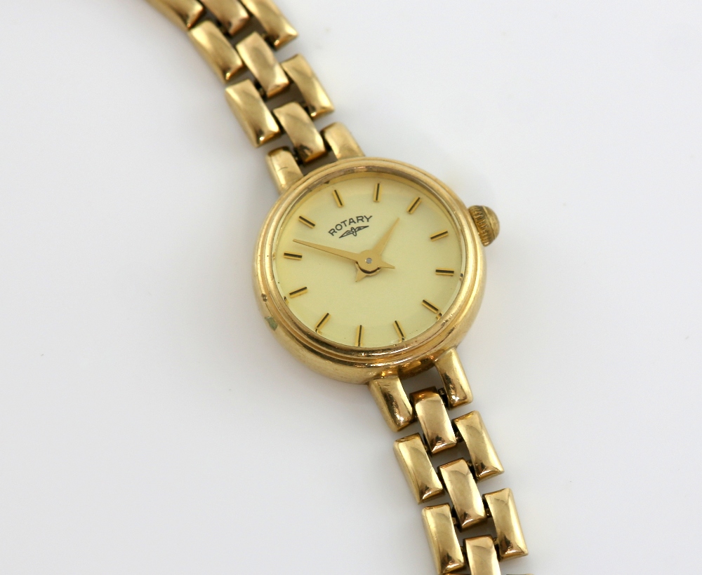 Ladies Rotary watch with quartz movement on a 9ct gold bracelet .
