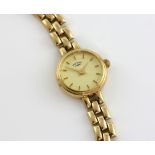 Ladies Rotary watch with quartz movement on a 9ct gold bracelet .