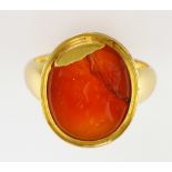 19th C carnelian intaglio ring, oval carnelian with intaglio of the profiles of two men, carnelian