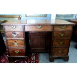 19th century mahogany kneehole desk with drawers with a cupboard door in the kneehole, 75cm x 120cm