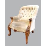 19th century walnut framed button back arm chair on cabriole legs