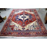 Persian type cream ground carpet the centre with a stepped medallion, one main red ground border,