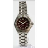 A Breitling Colt A57035 watch with red Arabic signed dial, white minute track and hands, date