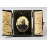 Miniature painting on ivory of a bearded gentleman in black tie and overcoat, appears unsigned,