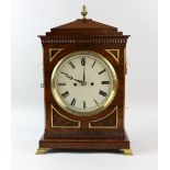 Regency style mahogany bracket clock with double fussee movement, brass inlay and flame finial and