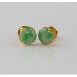 Jadeite jade stud earrings, round cabochon cut jade, measuring approximately 7 x 7mm, claw set in