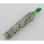 Edward VII silver scent bottle holder with pierced and scrolling decoration, with green glass