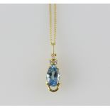 Aquamarine and diamond pendant, pear cut aquamarine, estimated weight 2.17 carats, with three
