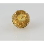 Vintage citrine cocktail ring, round cut stone, estimated weight 34.43 carats, mounted in ornate