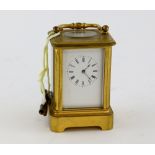 Miniature brass carriage clock inscribed La Petite Nee a Geneve, le 7 Avril 1869, 9.5cm x 5cm x 4.