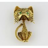 Vintage cat brooch, with round cut emerald eyes, mounted in 18 ct yellow gold, hallmarked London