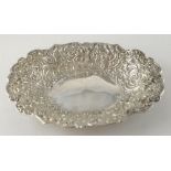 Victorian silver dish with embossed scrolling and floral decoration, by William Comyns & Sons,