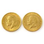 Two George V gold sovereigns, 1911 and 1930 .