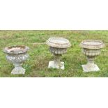 Pair of composite stone garden planters, diameter 40cm and another