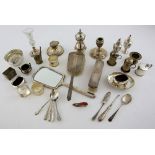 Group of silver items to include dressing-table mirror, brushes, inkwell, napkin rings, shoe-form