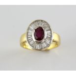 Ruby and diamond cluster ring, central rub over set oval cut ruby, estimated weigh 0.80 carats,