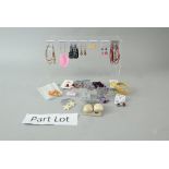 Collection of modern costume earrings, including beaded drop earrings, studs and hoop earrings, with