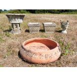 Pair of composite stone garden planters, oval garden planter, terracotta garden planter and another,