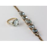 1940's aquamarine and white sapphire bracelet, mounted in yellow metal to be testing as 9 ct,