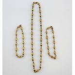 Unoaerre Italy, gold textured bead necklace, measuring approximately 42cm in length, with lobster