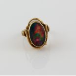 Dress ring, set with opal triplet measuring approximately 15.6 x 9.7mm, mounted in yellow metal