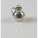 Edward VII silver pepper pot in the form of a Jersey cream urn, with enamelled Jersey cartouche,
